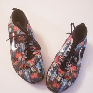 Original Nike's multi colored women free training shoes.